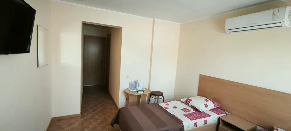 Трехместный номер с удобствами в мансарде