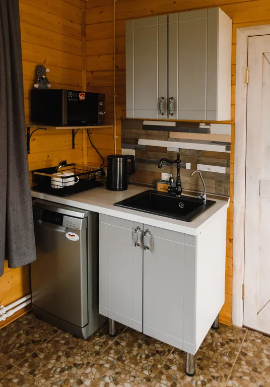 Коттедж с сауной для семейного отдыха в стиле барнхаус