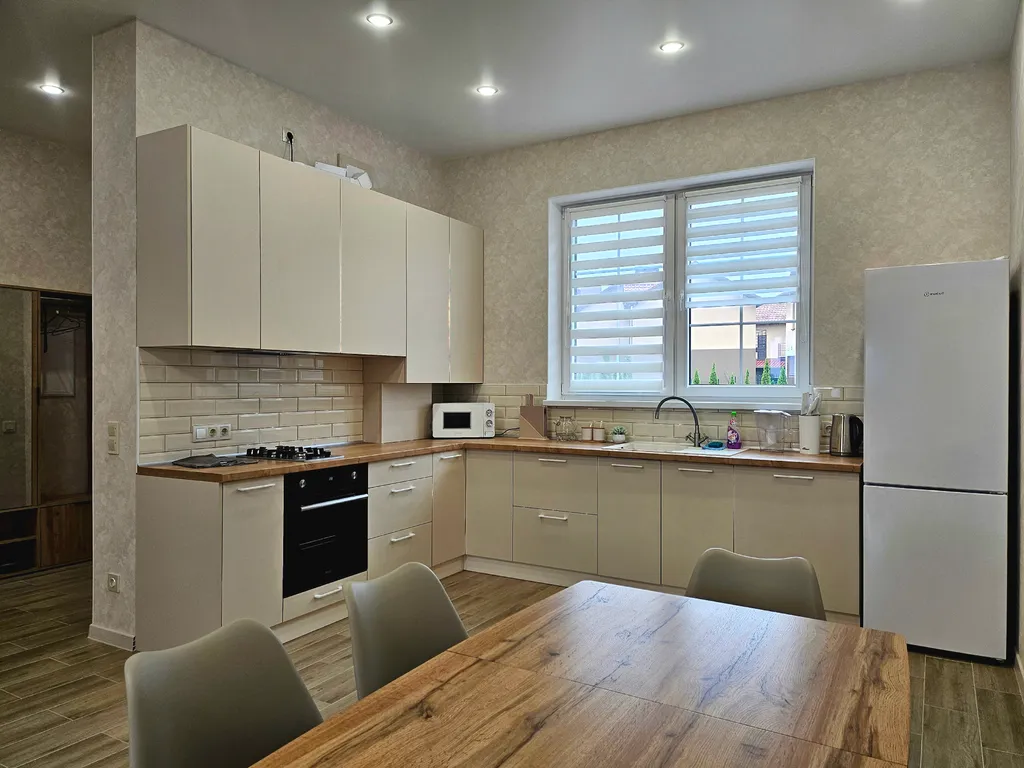 Домик у моря с зоной барбекю