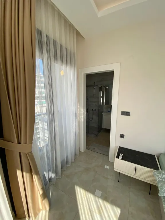 Отличные новые апартаменты 2+1 в центре Махмутлара в Алании