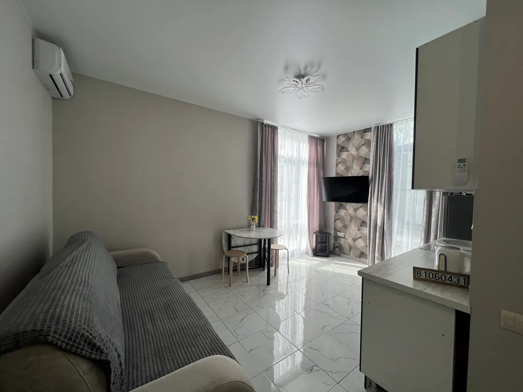 Квартира Квартира Уютная студия — Сириус