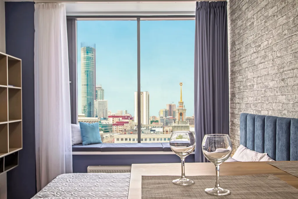 Дизайнерские апартаменты лофт в центре с видом на город