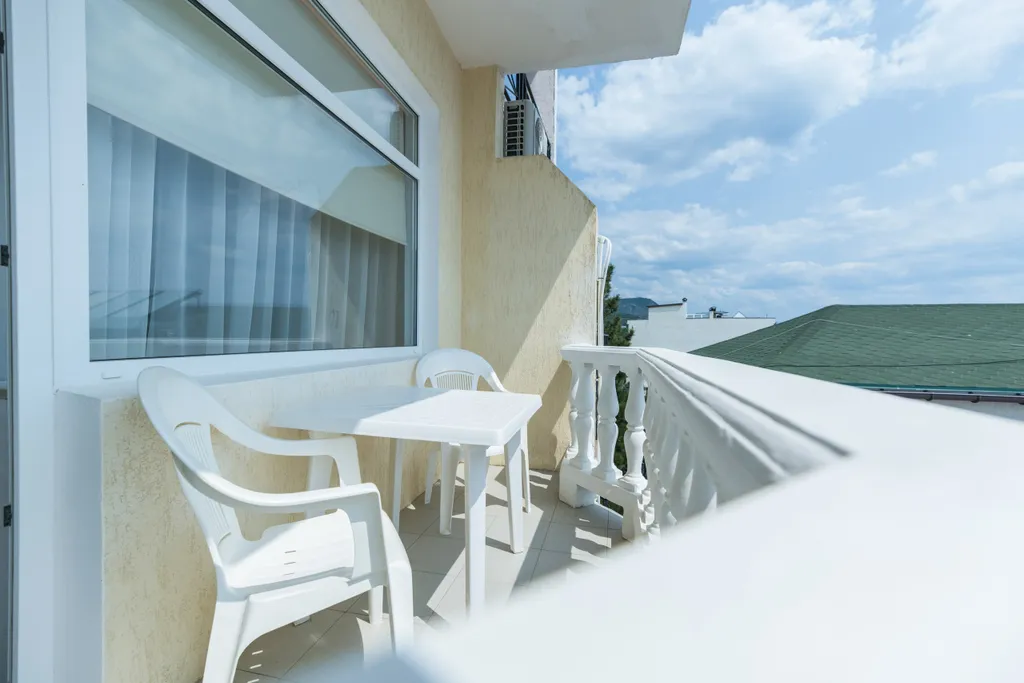 Апартаменты 7,9 с кухней и балконом, с частичным видом на море