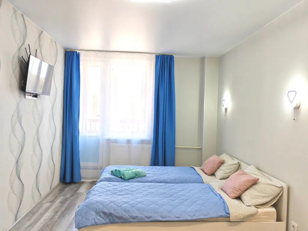 Уютная студия в новом доме с видовым балконом