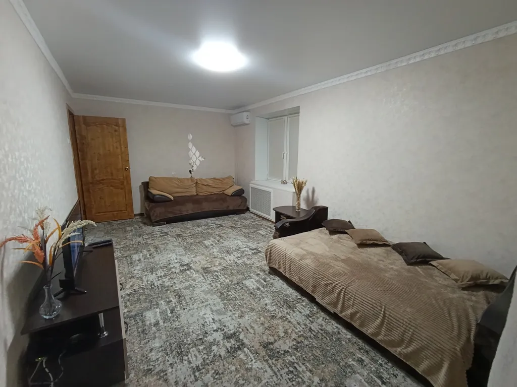 Уютная квартира с видом на горы в центре города