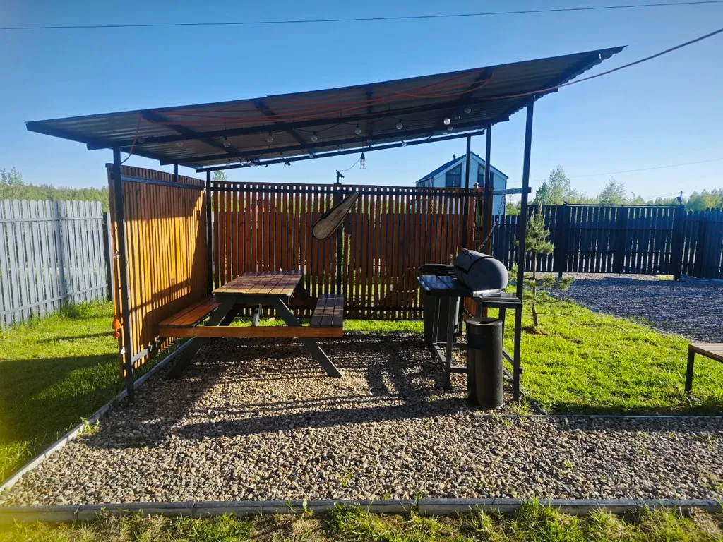 Коттедж с сауной для семейного отдыха в стиле барнхаус