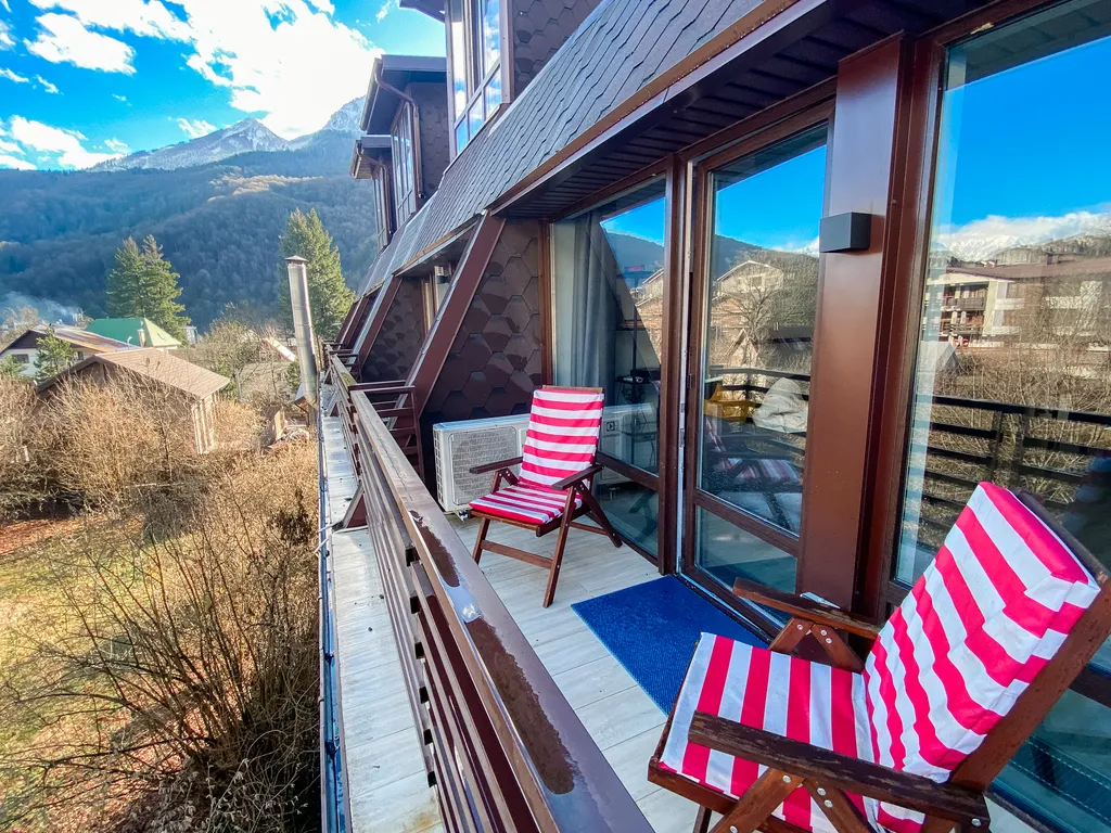 Апартаменты с террасой с панорамным видом на горы