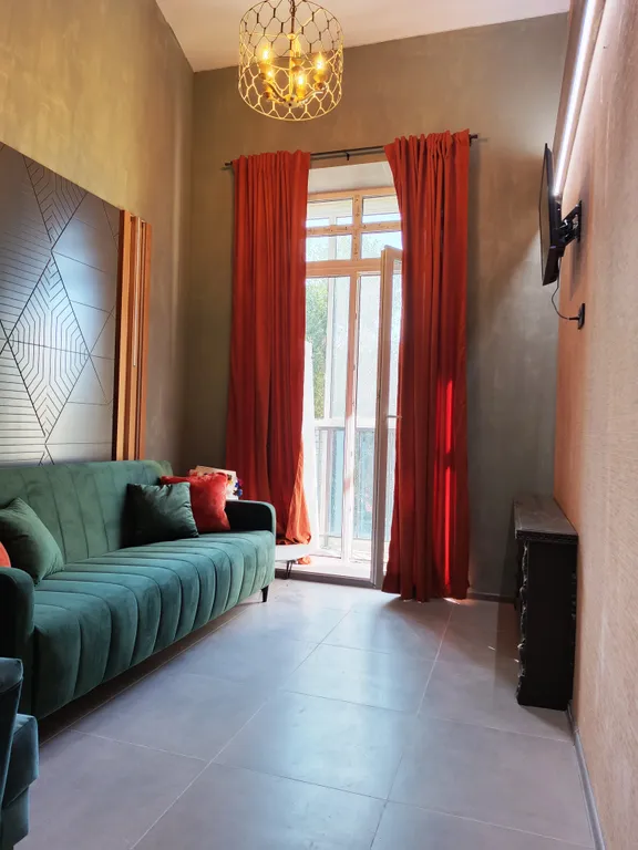 Атмосферная двухуровневая квартира с видом на Петропавловский парк