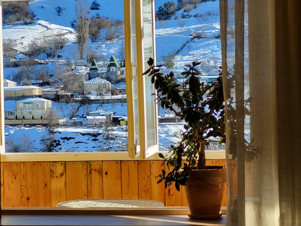 Квартира с видом на реку и горы