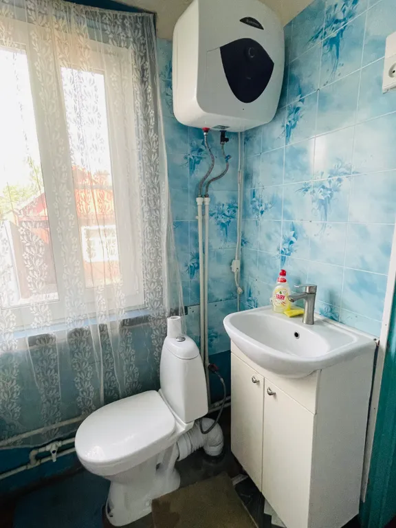 Дом с парковкой во дворе