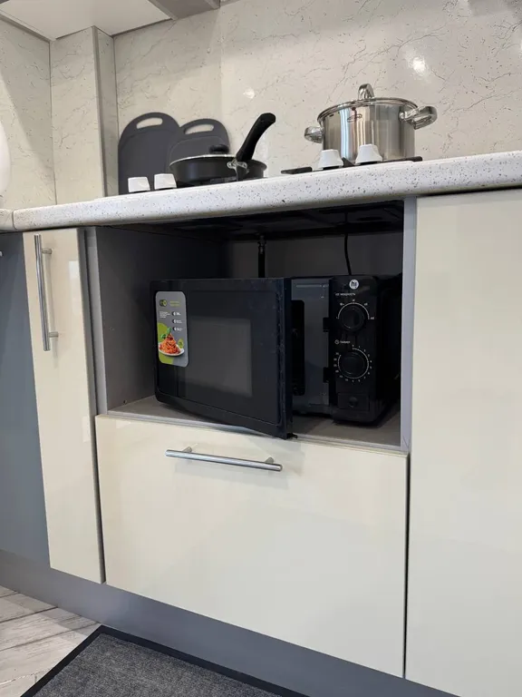 Уютная квартира с панорамными окнами и шикарным видом на город