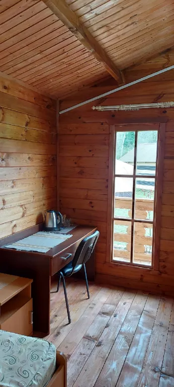 Дом в деревне на берегу реки для спокойного отдыха