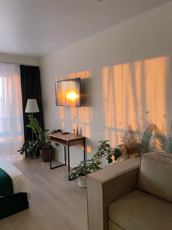 Красивая и уютная студия с видом на закат