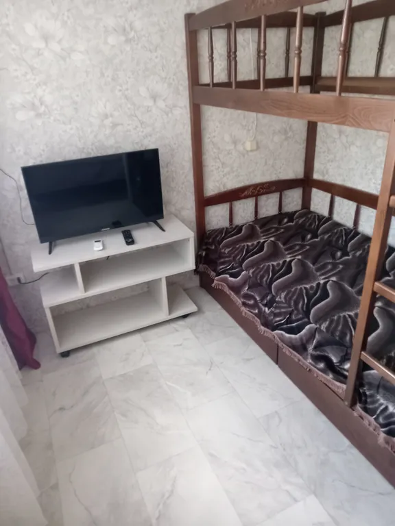 Уютная комната в золотом квадрате Западного