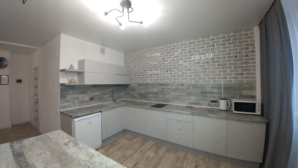 Комфортабельная квартира-студия в стиле лофт