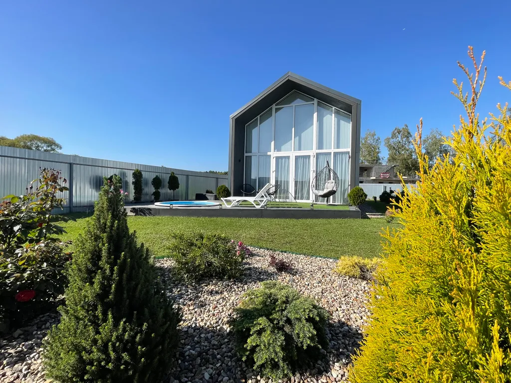 Дом в стиле БарнХаус с тёплым бассейном