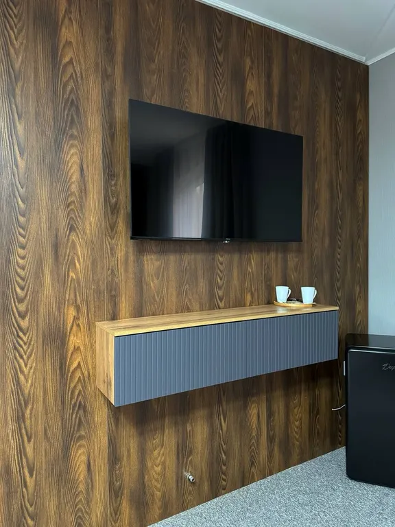 Люкс с балконом и видом на горы и лес