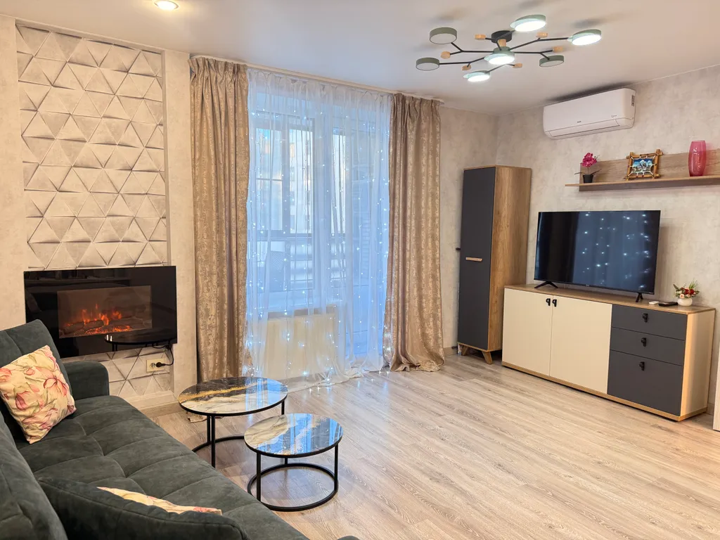 2-комнаты в центре с камином и подземной парковкой