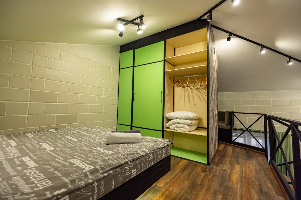 Двухуpовнeвaя cтудия с сауной Mерлин Монрo