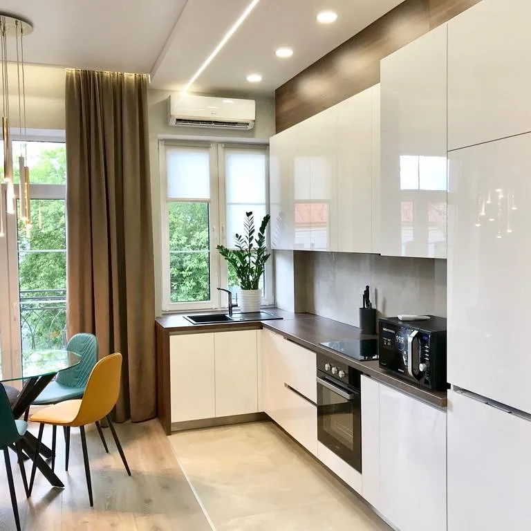 Новая квартира с подземным паркингом в центре