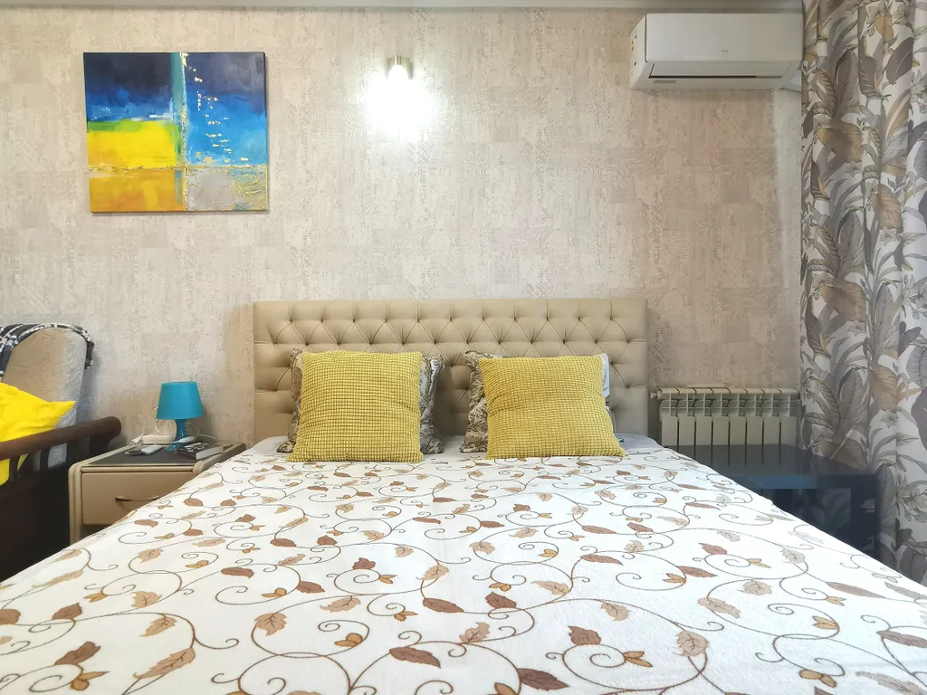 Солнечная квартира с видом на город