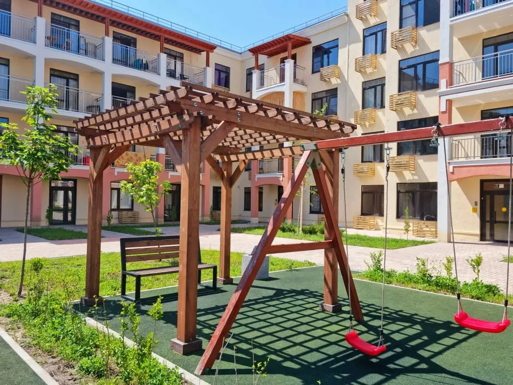 Апартаменты с большой кроватью в Холидей Хаус