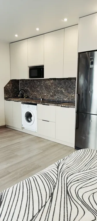 Светлая студия в центре