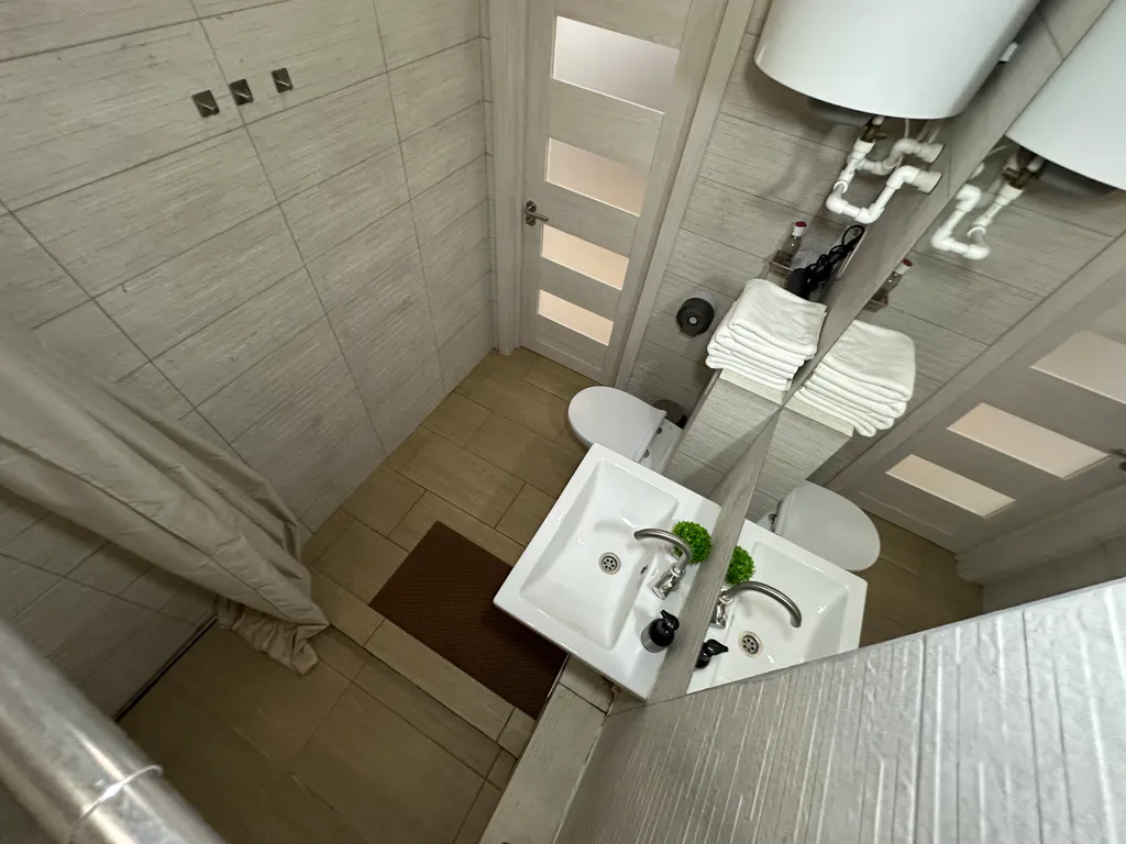 Двухэтажные апартаменты с балконом Столица 2313