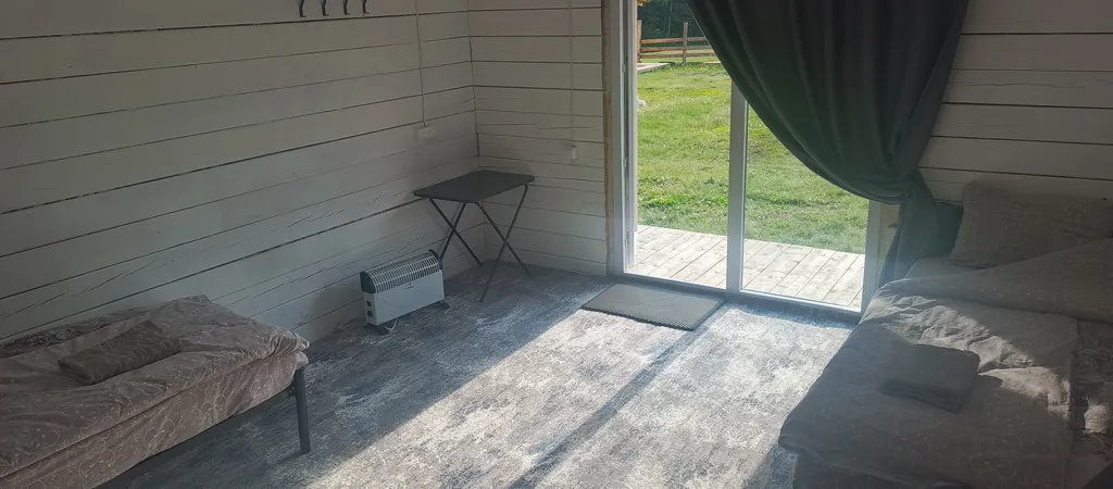 Уютный домик с видом на горную долину