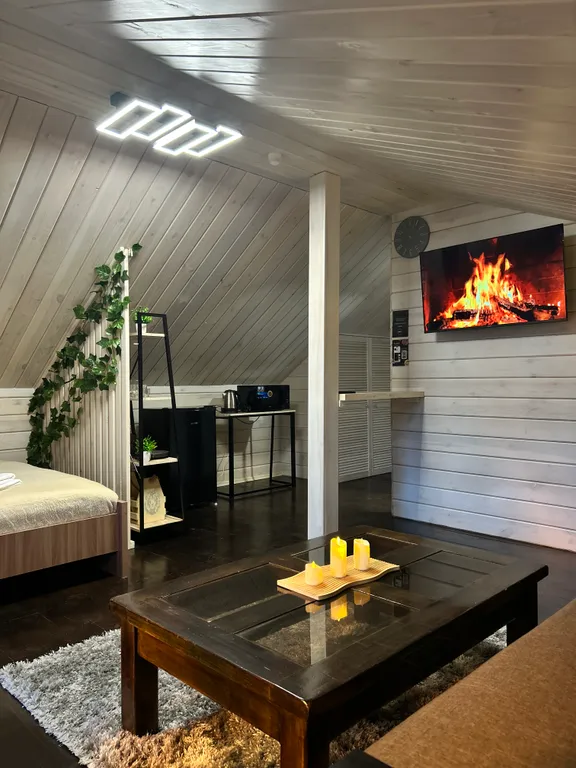 Уютный номер на крыше с террасой