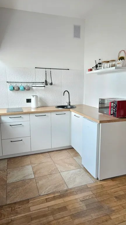 Студия Wood на булыжной мостовой от Mascaron Apartments