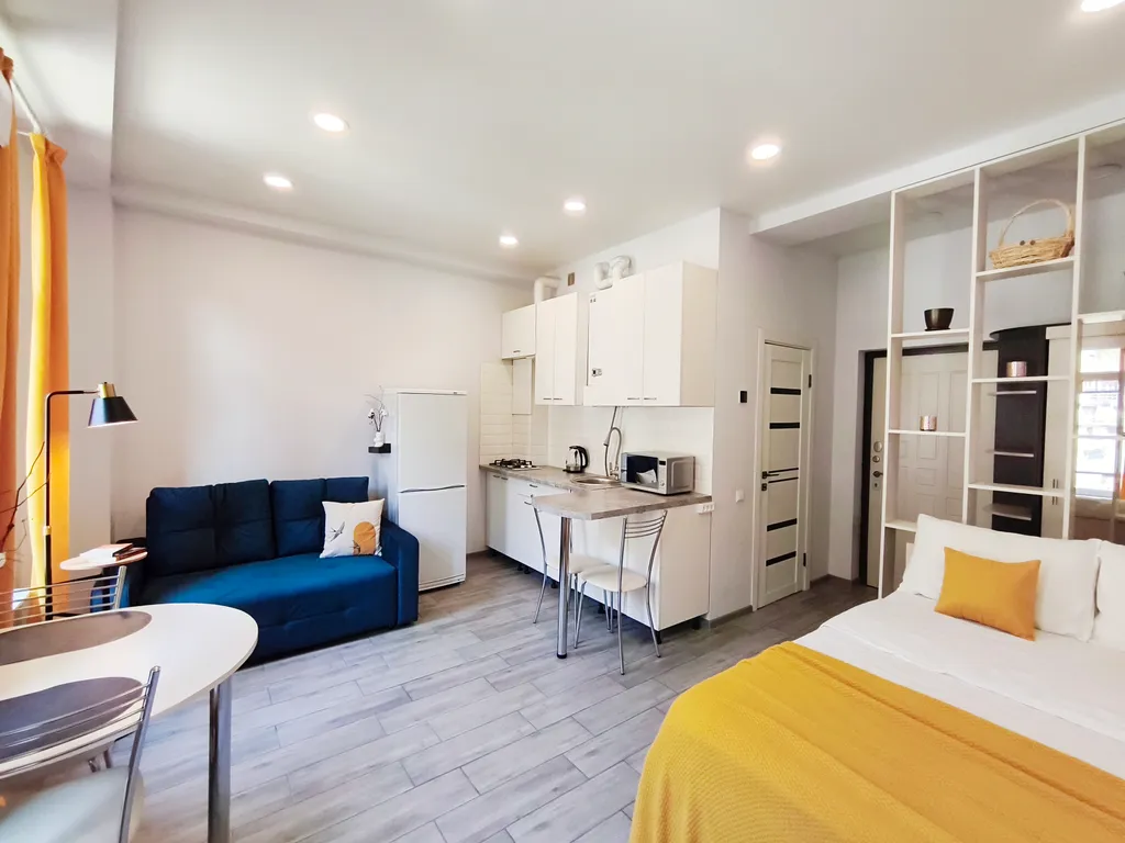 Современный апартамент-студия с видом на горы