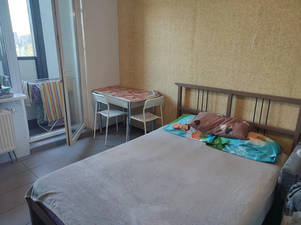 Студия в современном новом доме на проспекте Строителей