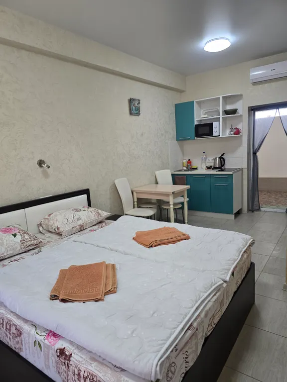 Комната в городке Олимпия