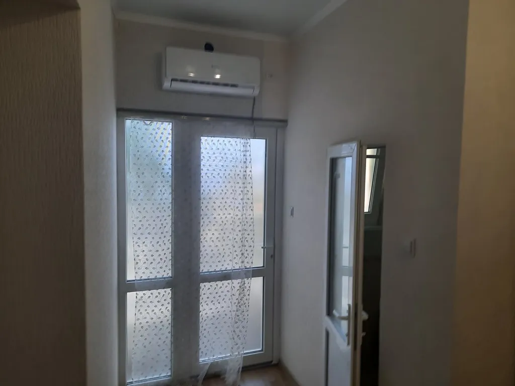 Номер с кухней в центре города со своим двориком