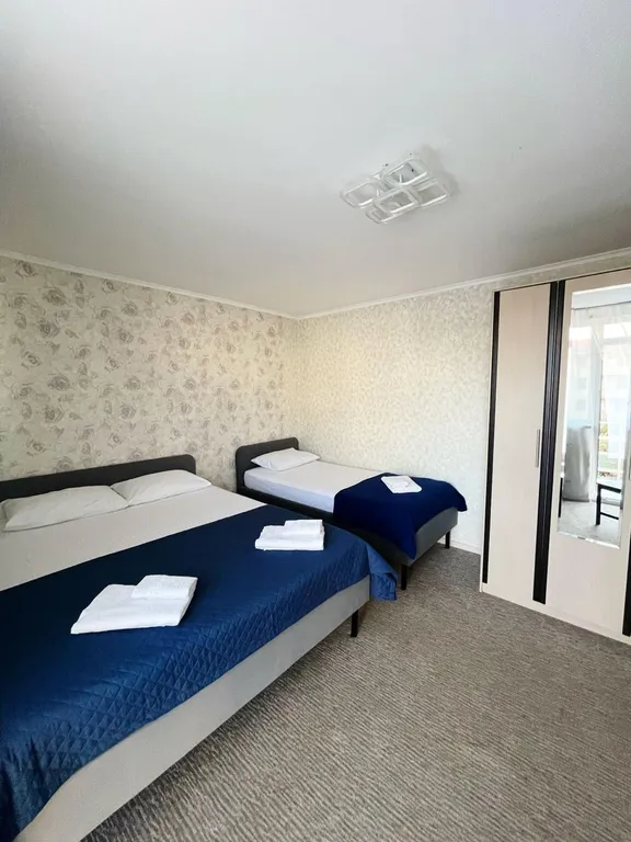 Делюкс трехместный с балконом