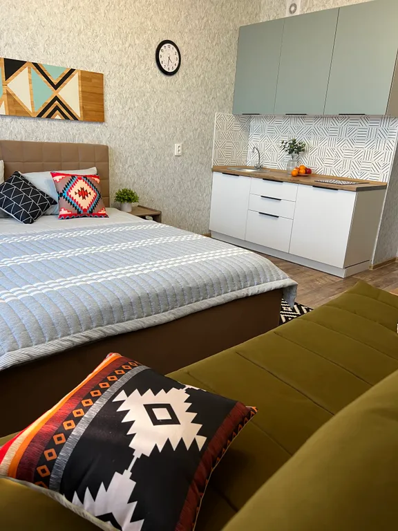 Студия на высоком этаже в новом доме