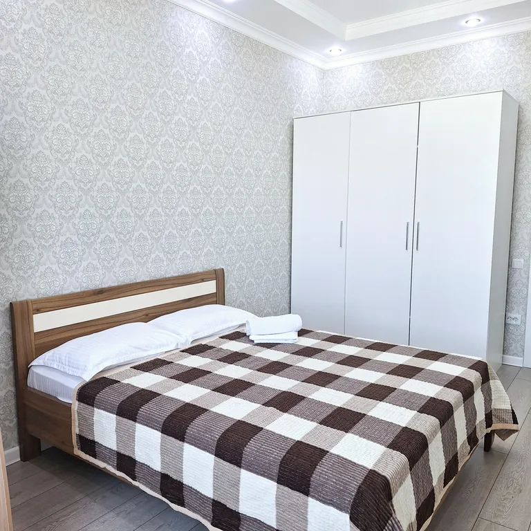 Апартаменты в центре с видом на город и горы