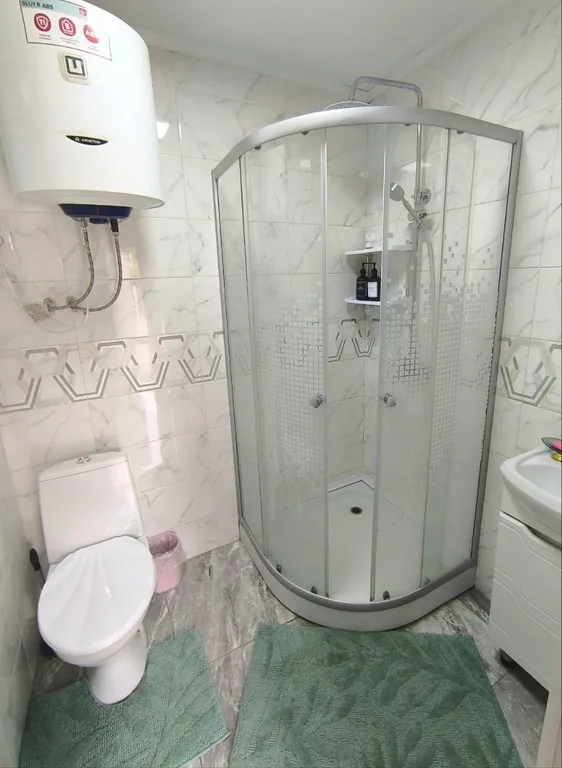 Уютный дом с садом рядом с центром города