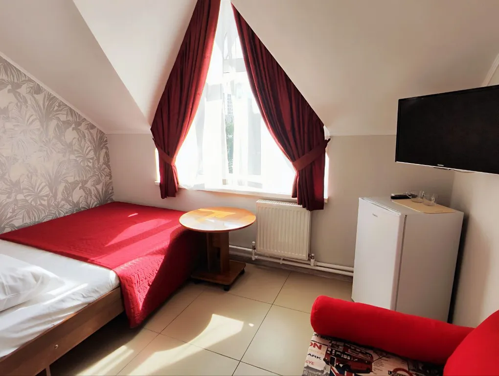 Квартира Квартира Двухместный номер на мансарде в гостевом доме Регион 86 — Адлер