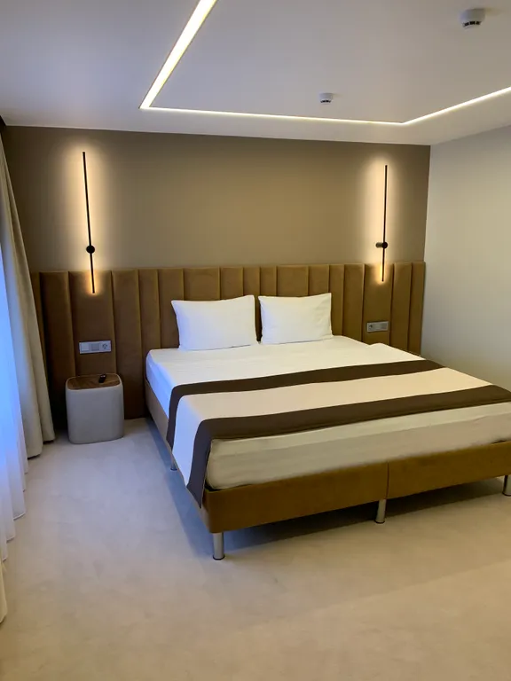 Двухместный,двухкомнатный номер Джуниор Сюит с одной общей кроватью