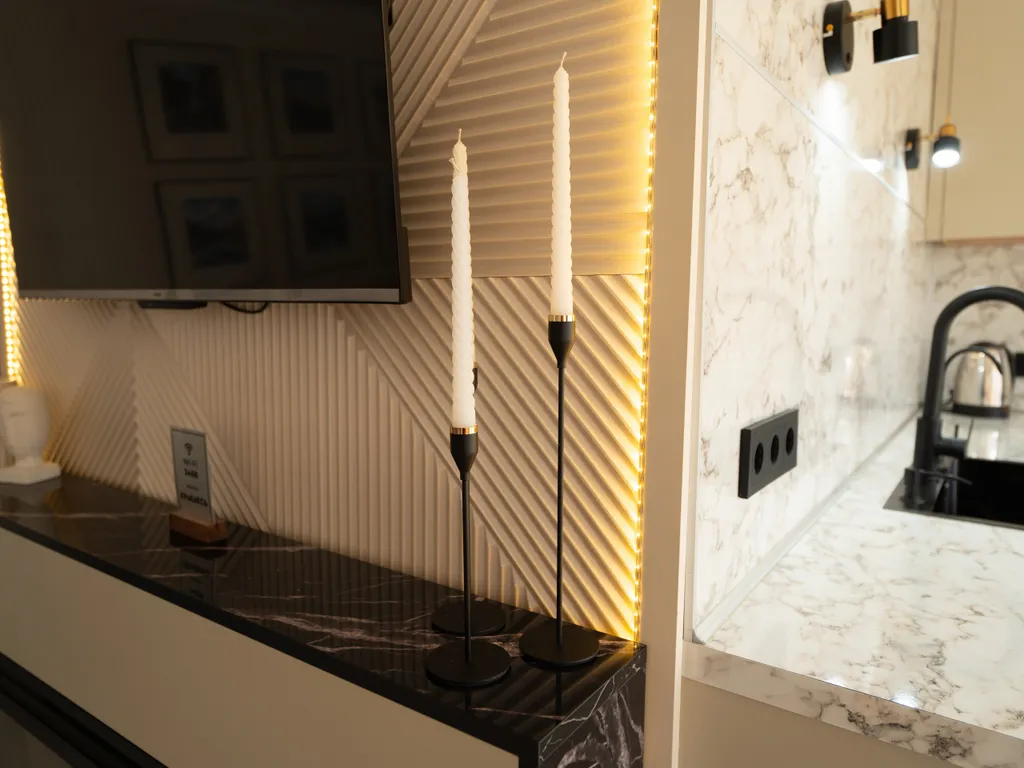 Дизайнерская квартира с видом на горы в центре Домбая