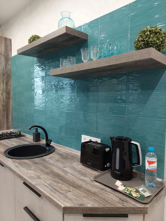 Студия с камином и креслом - коконом для двоих