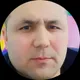 Комил
