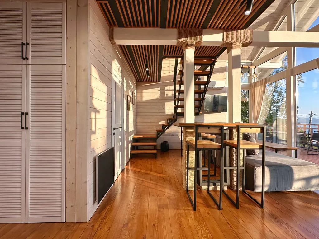 Шале с видом на бухту и вулкан