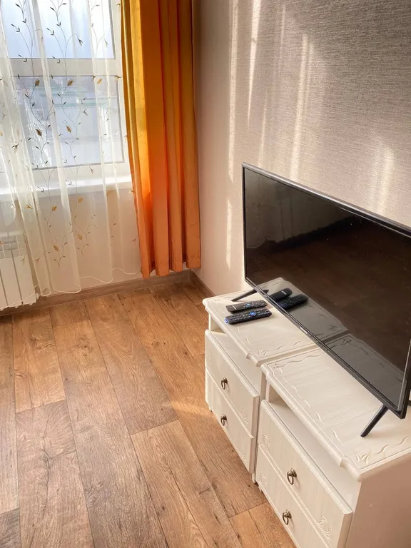 Уютная квартира с ортопедическим матрасом и панорамным балконом