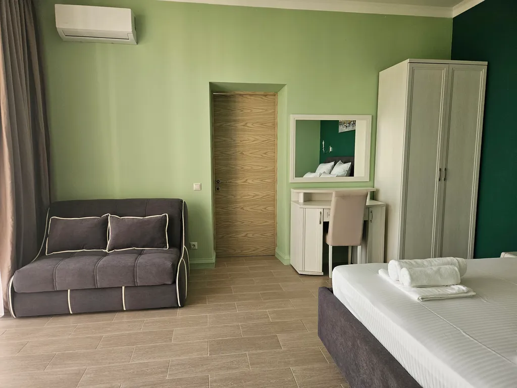 Апартаменты в  отеле Атлас