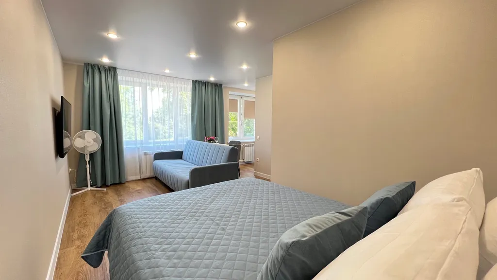 Апартамент у часовой башни и дома гильдии