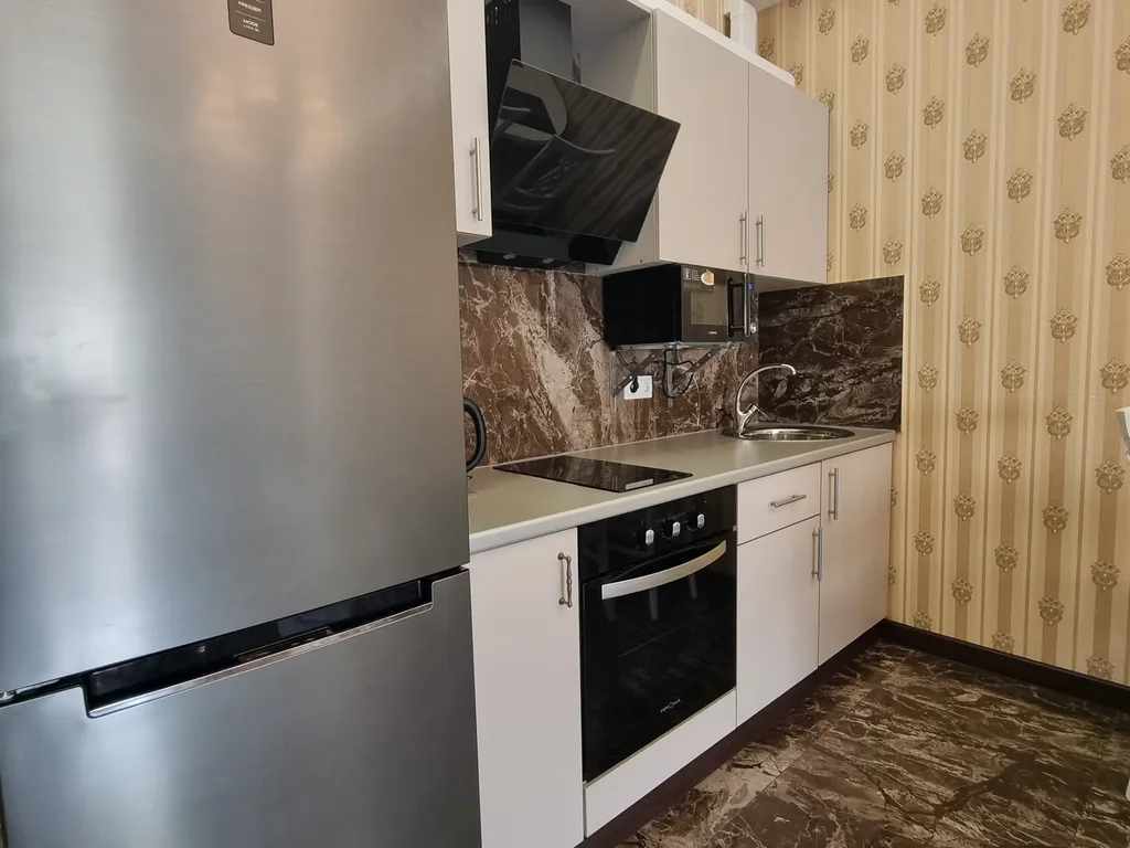 Aпаpтaмeнт c баcсейном и теpрaсой нa набеpeжной