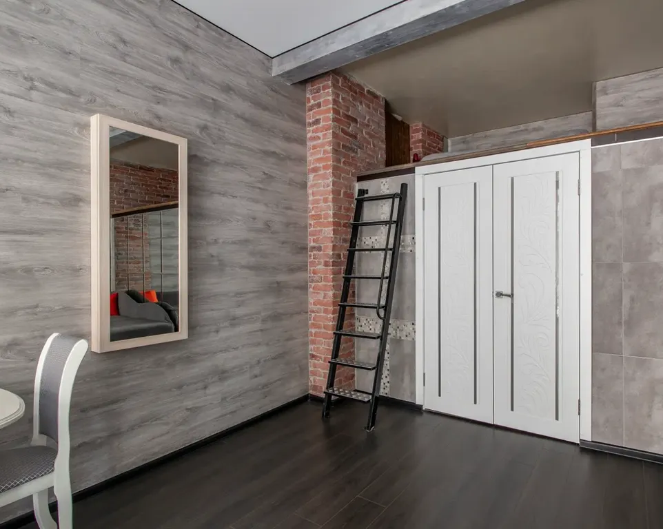 Дизайнерская двухуровневая квартира на Невском